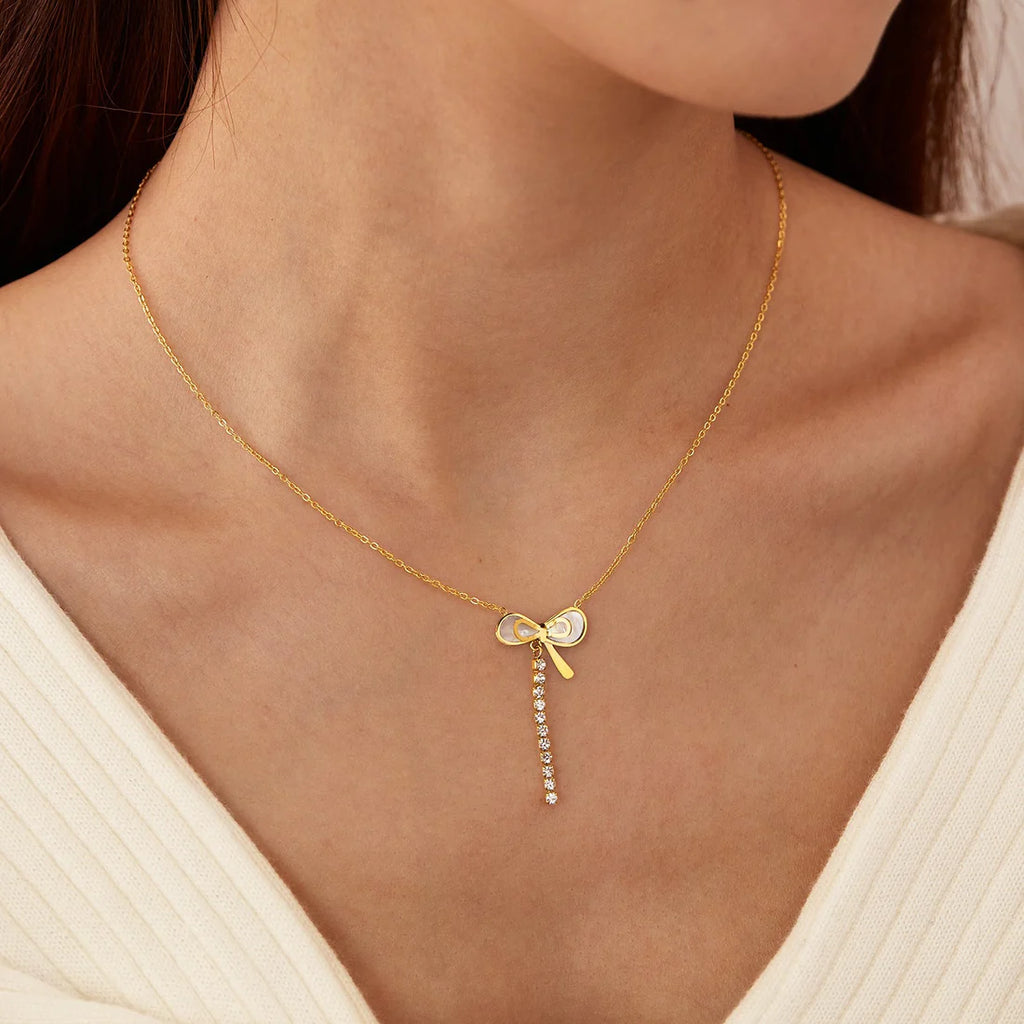 Luxury Mother of Pearl Bow Necklace with Crystal Tassel – Titanium Steel
