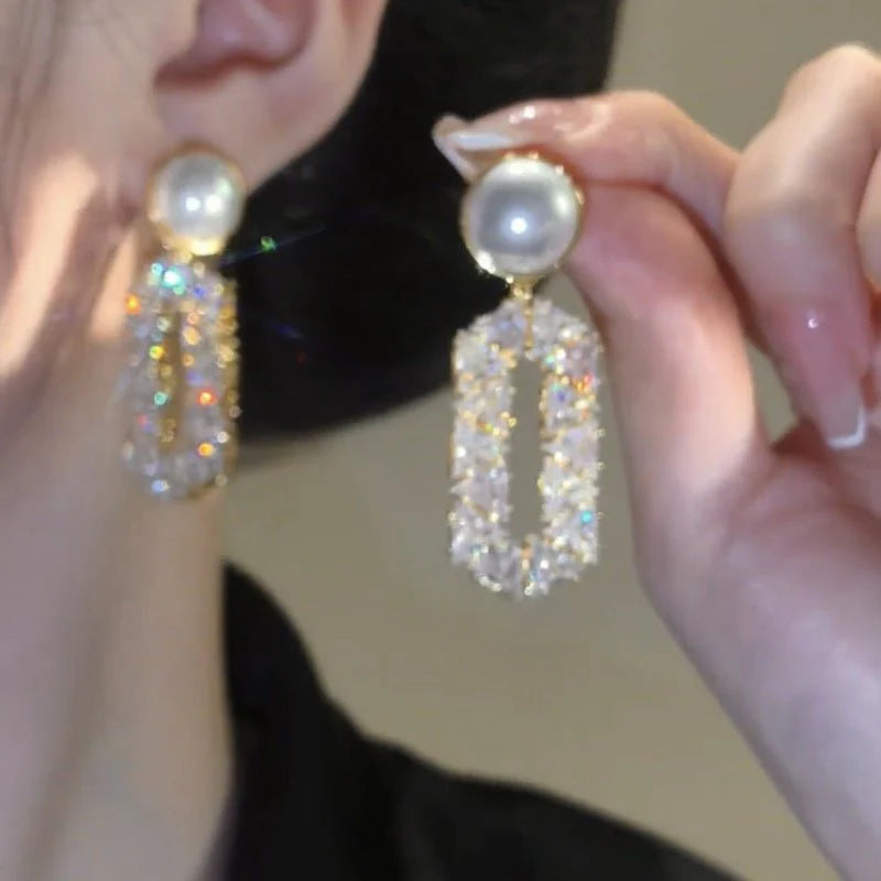 Exclusive Oval Diamond Drop Earrings with Refined Pearl Elegance