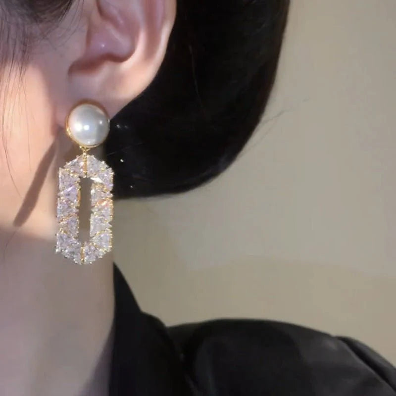 Exclusive Oval Diamond Drop Earrings with Refined Pearl Elegance